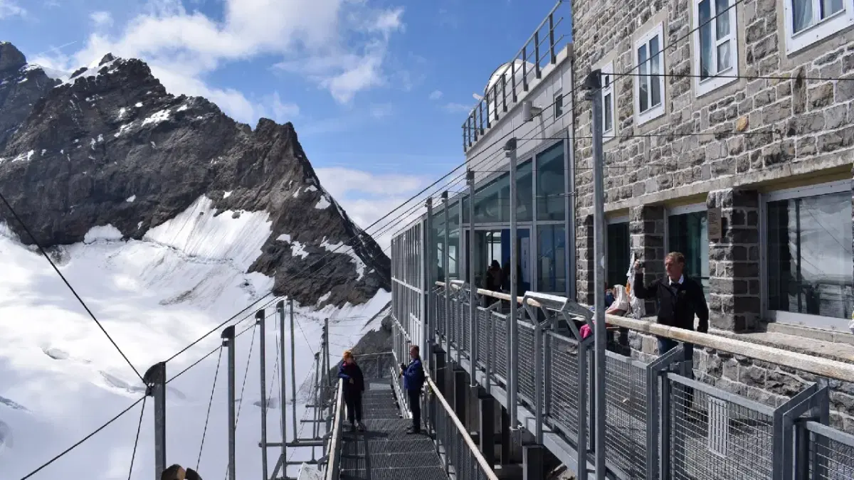 side view of sphinx observatory aside of the alphine ranges of jungfraujoch