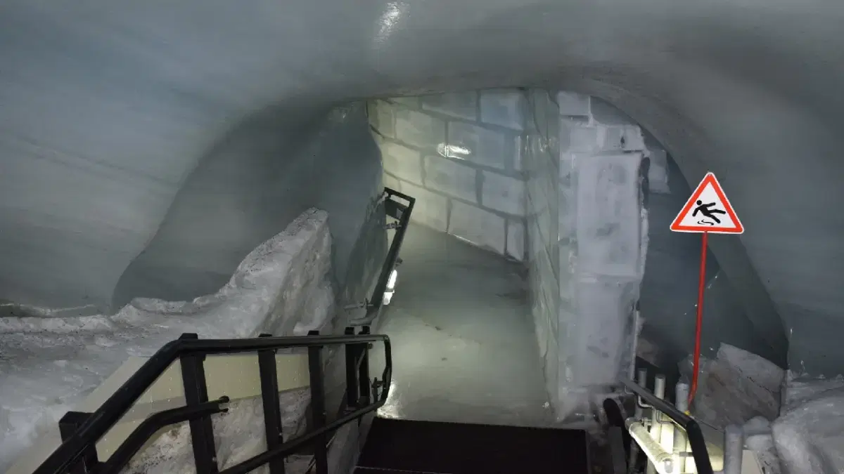 Ice Palace (Eispalast) pathway with a slippery caution sign board