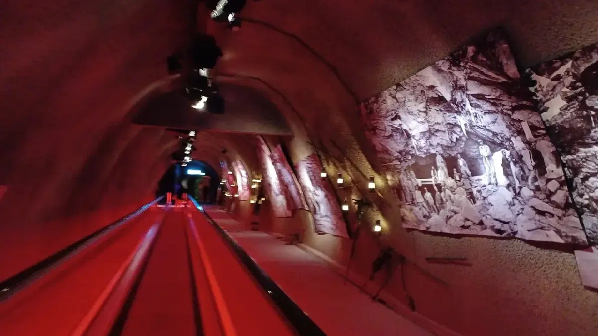 long corridor of Alpine Sensation with a display picture