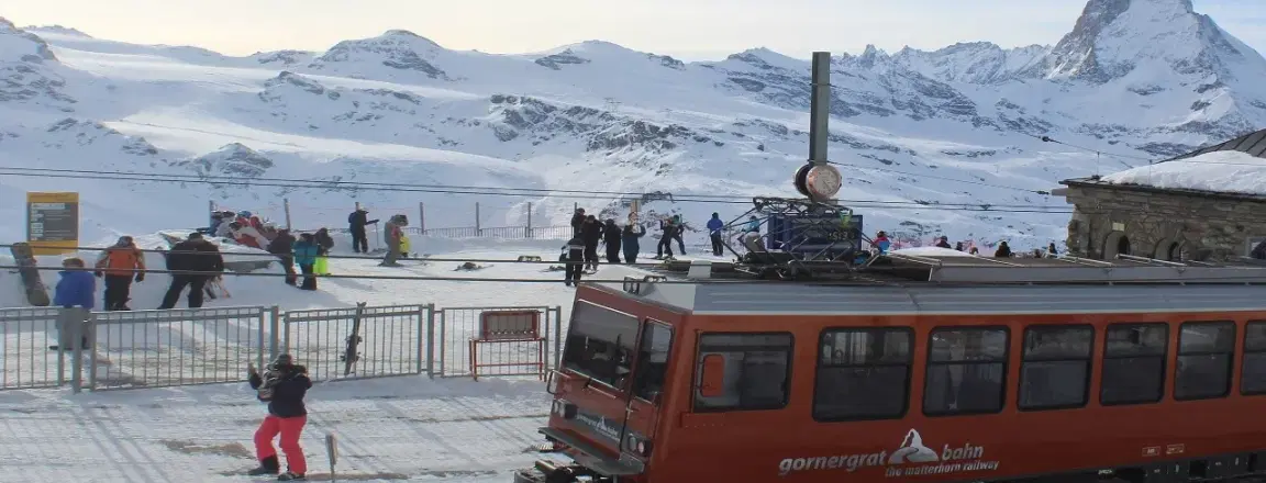 view of gornergrat railway train with matterhorn at the background