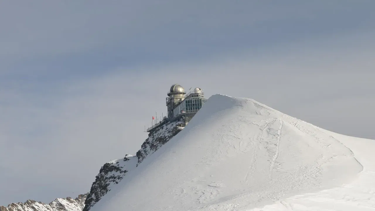 View of sphinx observatory over the alphine ranges of jungfraujoch