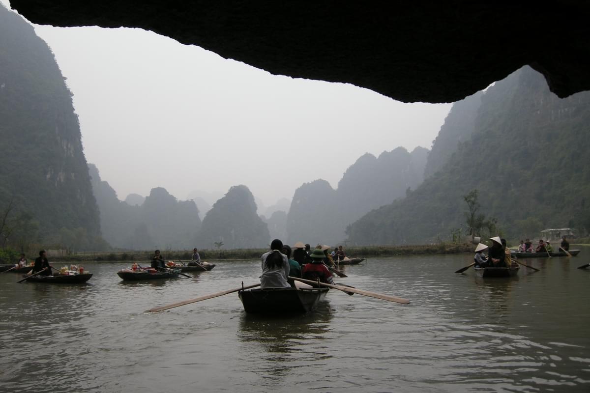 Take a boat ride to witness the Trang An Grottoes