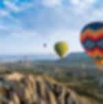 Full Day Cappadocia South Tour with Underground City, Red Valley, Cavusin, Ortahisar, Pigeon Valley and Hot air balloon flight with Shared Transfers