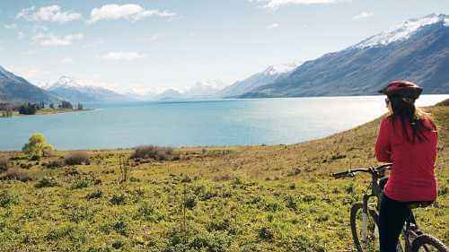 Exciting Lake Wakatipu Cruise and Half Day Cycling in and around the arena