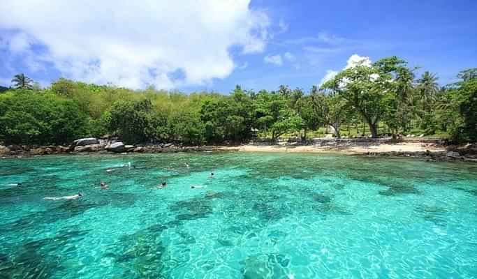 Exploring the coral island by speed boat with Shared Transfers