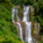Transfer with Ramboda Falls, Bakth Hanuman Temple, Tea Factory and Gregory Lake Enroute