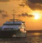 Experience a Sunset Dinner Cruise With Live Cabaret Show by Bali Hai with shared transfers