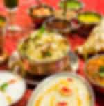 Lunch or Dinner at Indian restaurant with Return Transfers - max 2 hours