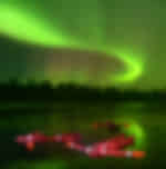 Ice Floating in Lapland With Northern Lights