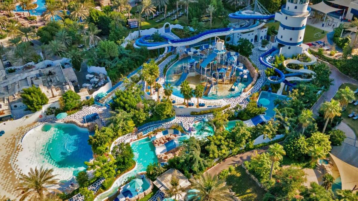 Aerial view of Jungle Bay Waterpark in Dubai, with Mediterranean-style decor and tropical attractions.